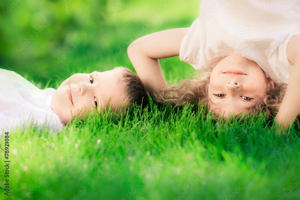 Happy children standing upside down Happy children standing upside down