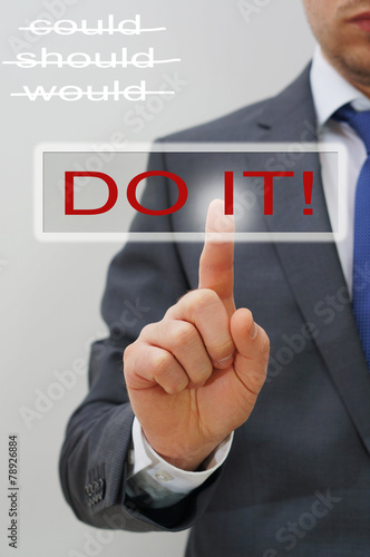 man touch DO-IT-Button