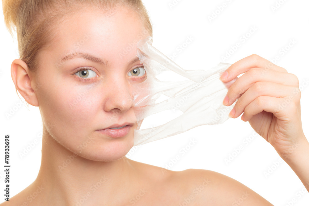 girl removing facial peel off mask girl removing facial peel off mask