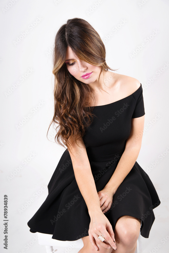 Beautiful sexy girl with long hair on a light background Beautiful sexy girl with long hair on a light background