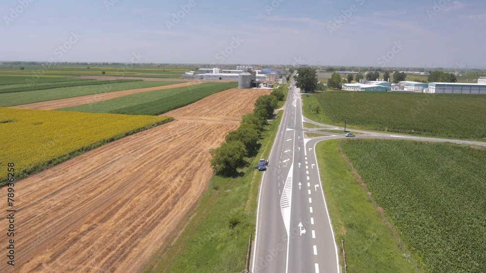 Aerial view on the roads, highway and agriculture fields close t Aerial view on the roads, highway and agriculture fields close t