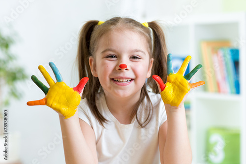 cute cheerful child with pa...