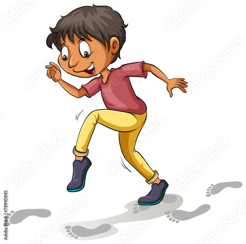 A boy following the footprints