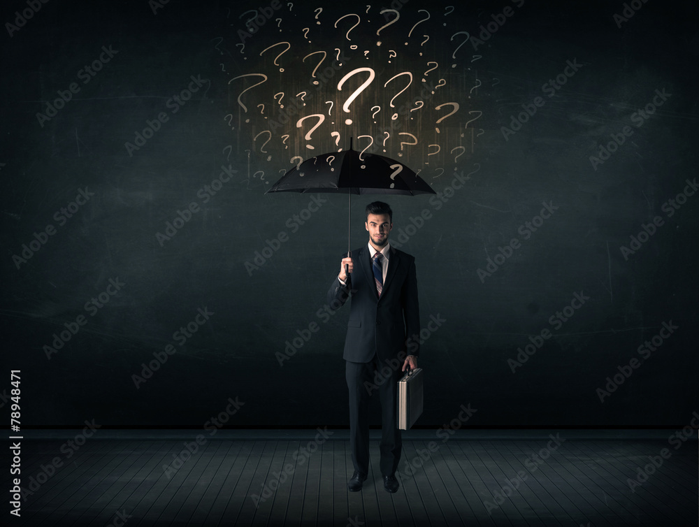 Businessman with umbrella and a lot of drawn question marks Businessman with umbrella and a lot of drawn question marks