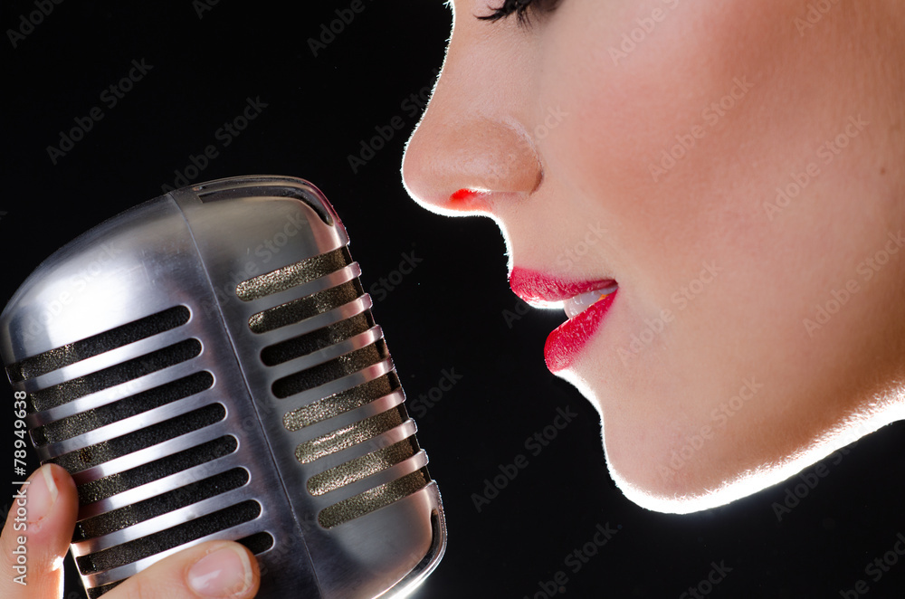 Red sexy lips and retro silver microphone Photos | Adobe Stock