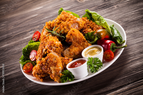 Fried chicken nuggets and vegetables