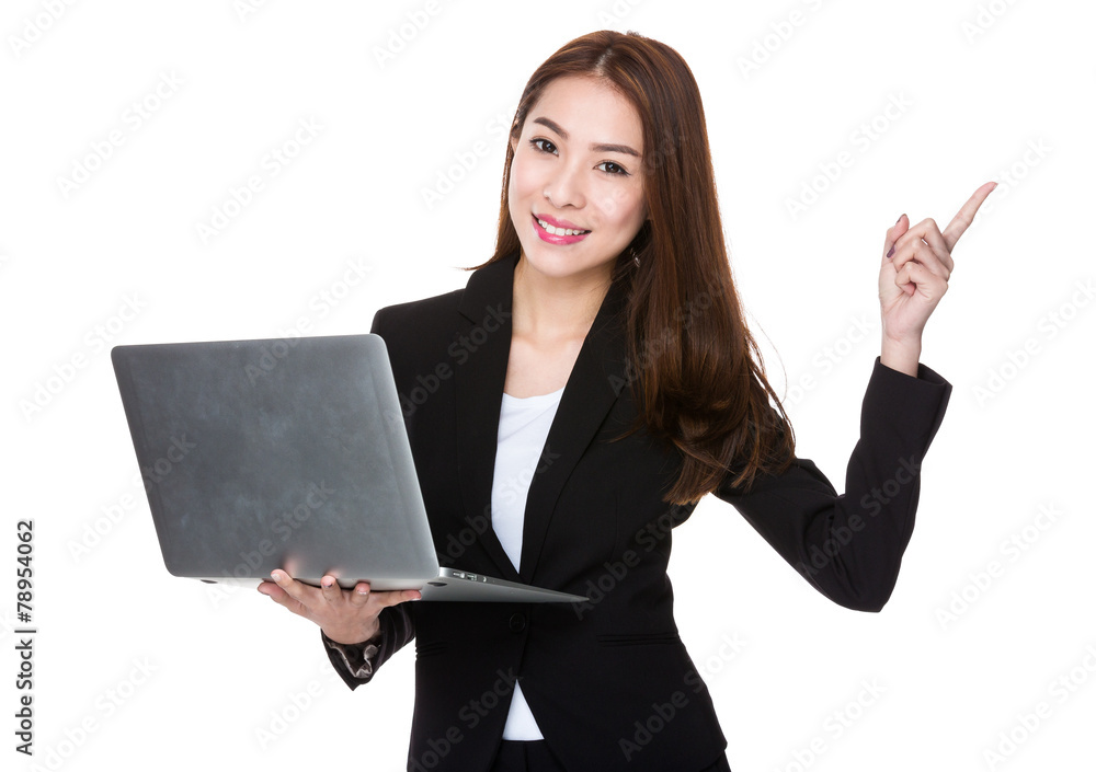 Business woman hold laptop and finger point up Business woman hold laptop and finger point up