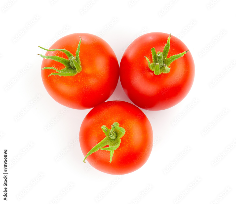 Red tomatoes isolated on a white background. Red tomatoes isolated on a white background.