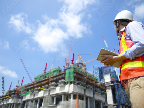 Construction worker using tablet