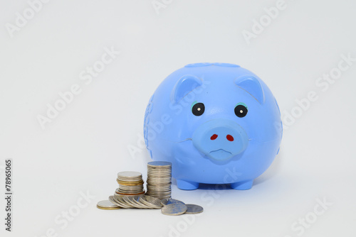 Foto Piggy bank and coins