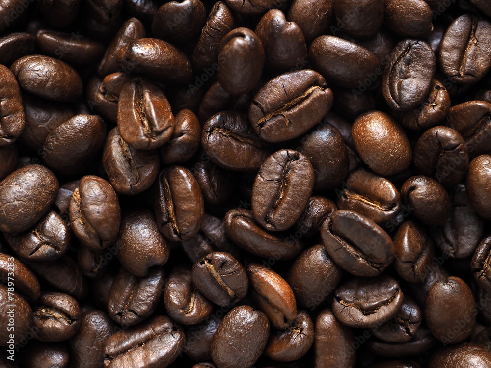 Roasted coffee crop beans background Roasted coffee crop beans background