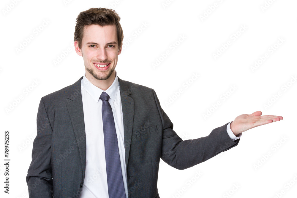 Businessman with hand promote something Businessman with hand promote something