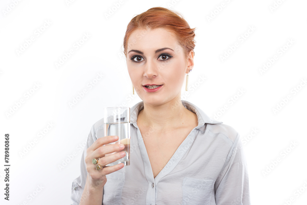 Happy young girl with a glass of water. Happy young girl with a glass of water.