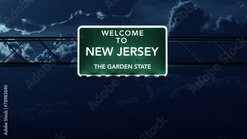 New Jersey USA State Welcome to Highway Road Sign at Night
