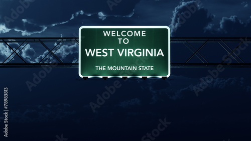 West Virginia USA State Welcome to Highway Road Sign at Night