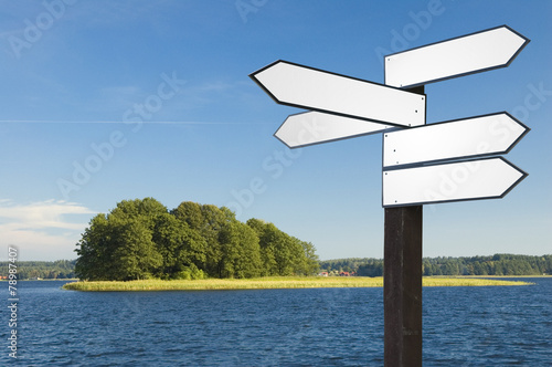 Guidepost on a lakeshore