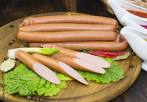 sausage on a wooden plate in a restaurant