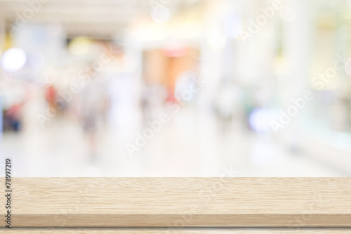 Empty table and blurred store bokeh background, product display