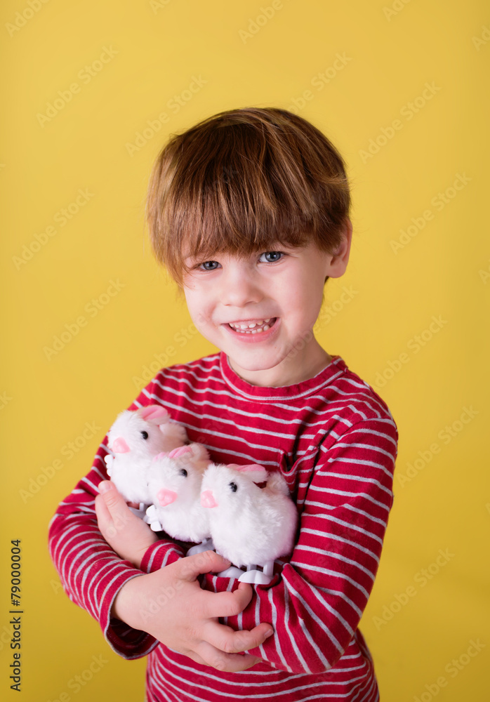 Child playing with Easter Bunny Toys Child playing with Easter Bunny Toys