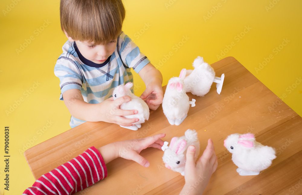 Kids playing with Easter Bunny Toys Kids playing with Easter Bunny Toys