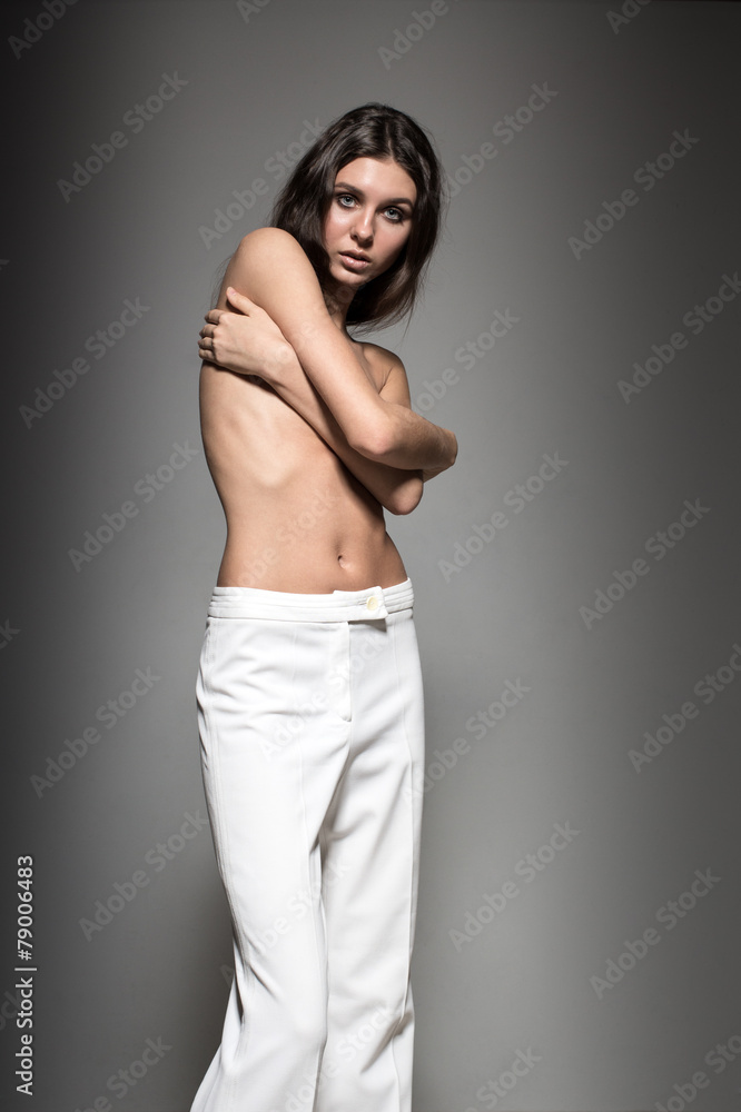 Young sexy brunette fashion model, topless, glamour photo shoot Young sexy brunette fashion model, topless, glamour photo shoot