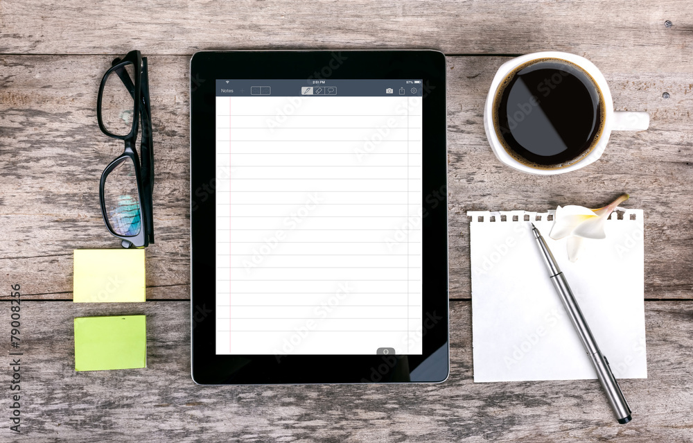 digital tabletdigital tablet as a note pad  and coffee cup wit