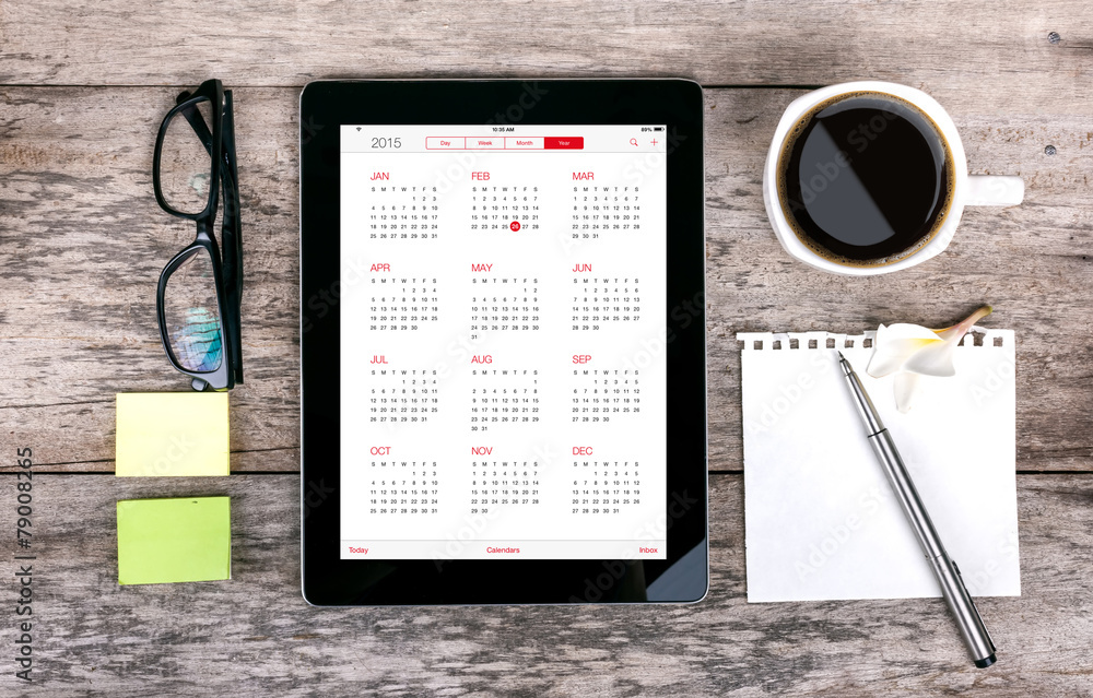 digital tabletdigital tablet as a calendar and coffee cup wit