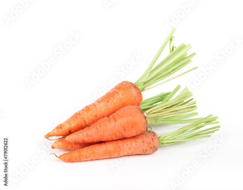 Fresh carrots on a white background