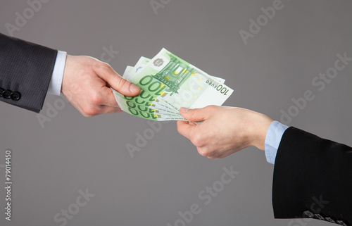 Wallpaper Mural Businessperson's hand accepting an offer of money Torontodigital.ca