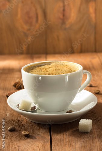 cup of coffee on wood