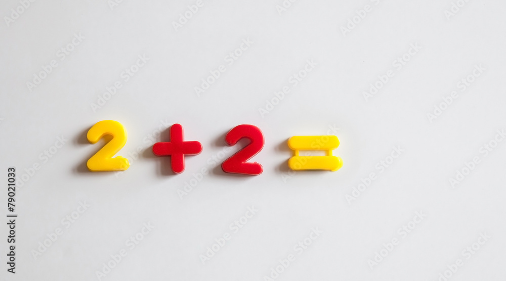 Toy numbers on a whiteboard Toy numbers on a whiteboard