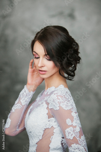 Close up of beautiful bride with perfect makeup and hair style