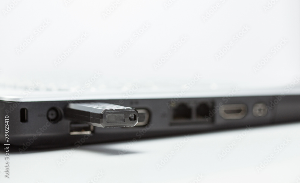 Laptop and removable usb memory - closeup shot Laptop and removable usb memory - closeup shot