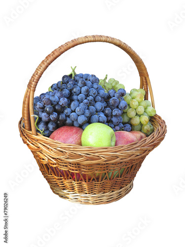 Fresh juise fruits in wicker basket isolated on white