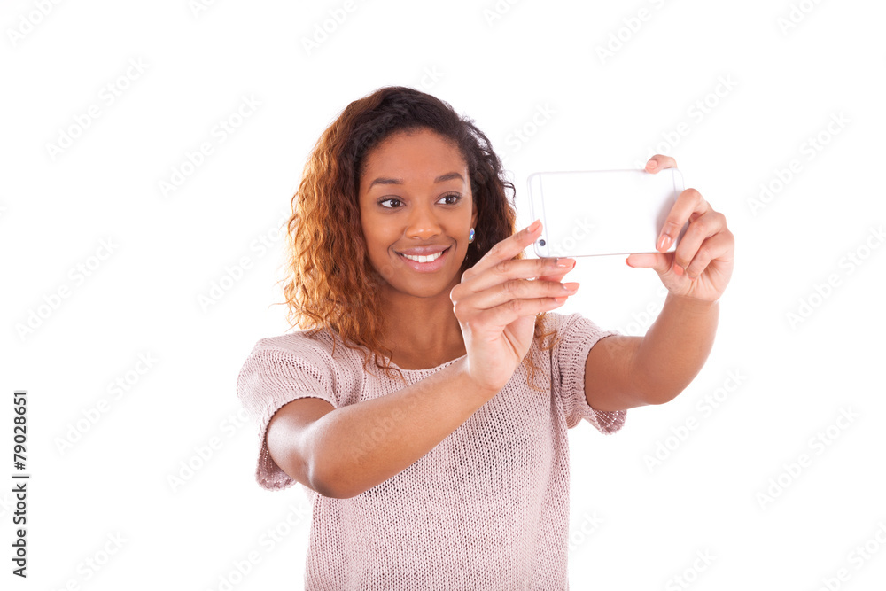 Young African American woman taking a selfie - self portrait - B Young African American woman taking a selfie - self portrait - B