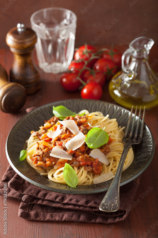 italian pasta spaghetti bolognese with basil on rustic table italian pasta spaghetti bolognese with basil on rustic table