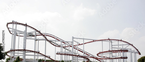 a rollercoaster in an amusement park