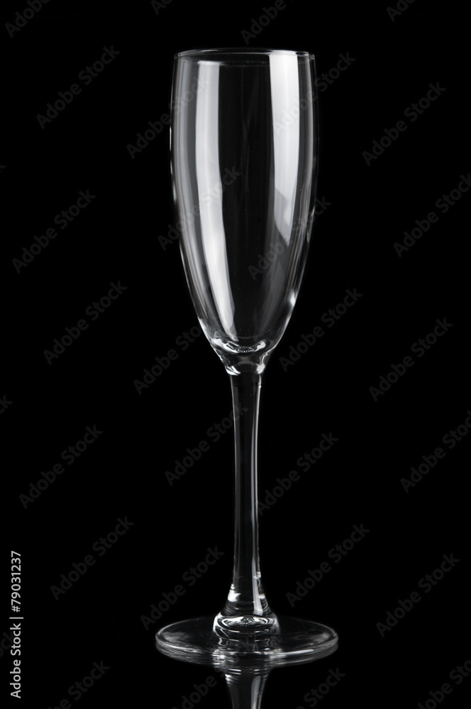 Champagne empty glass isolated on black background