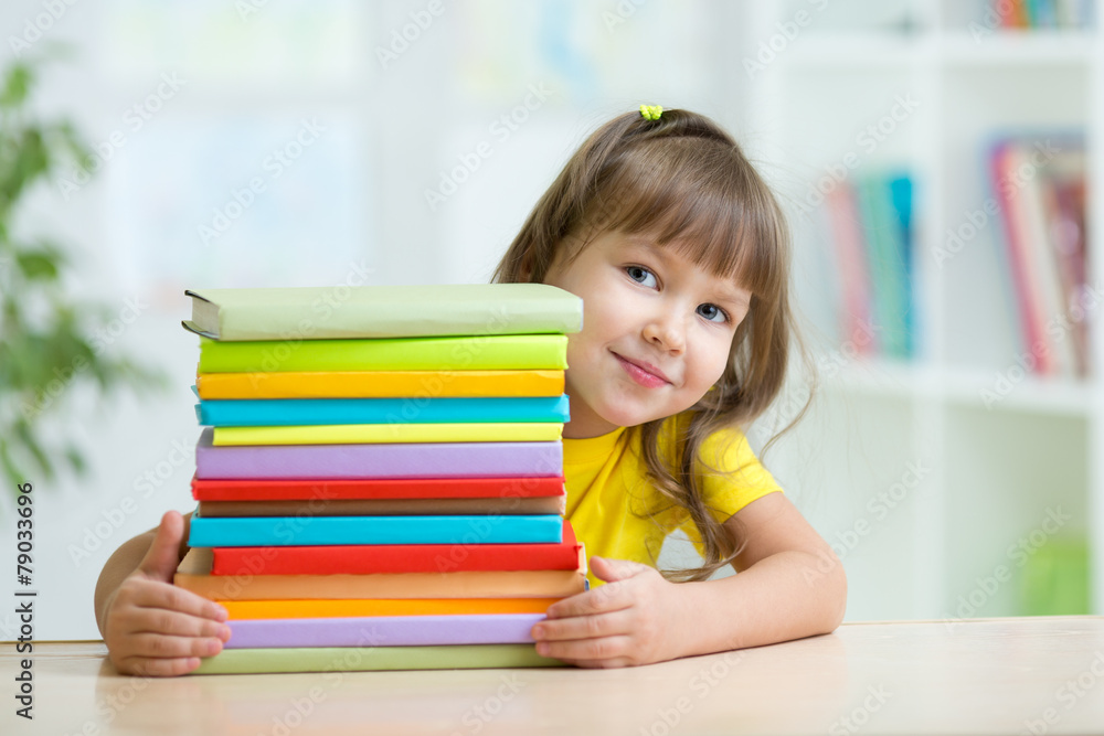 Smart kid girl preschooler with books Smart kid girl preschooler with books
