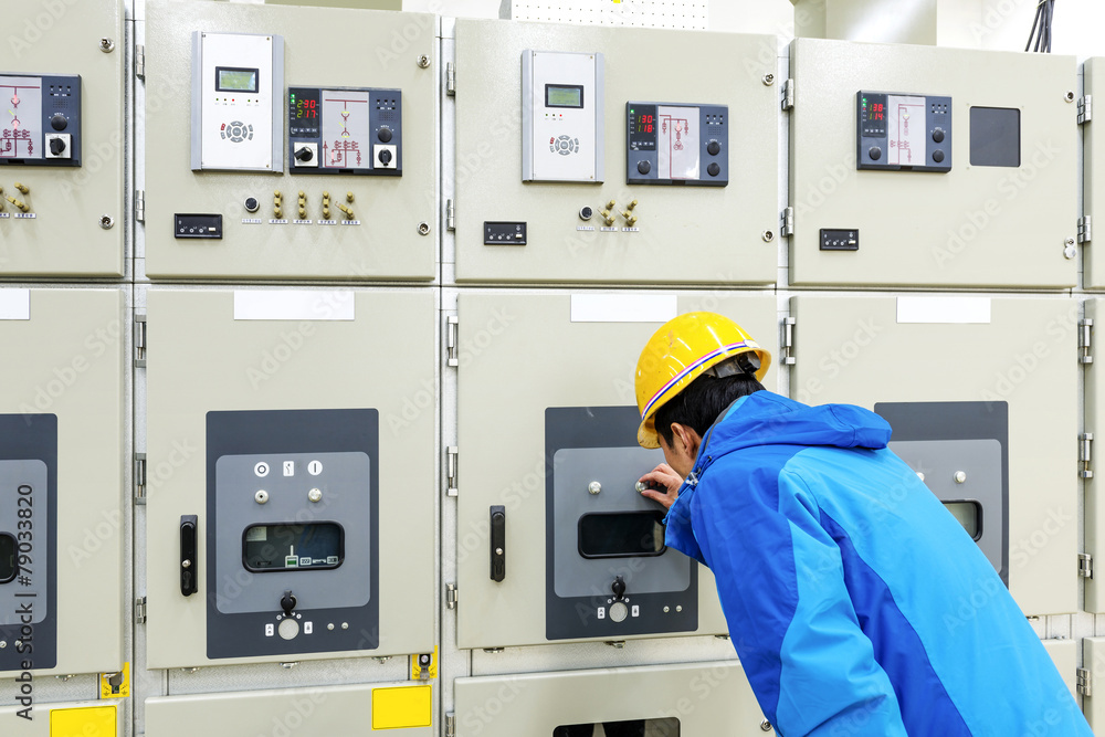man hand pressing button - starting industrial process man hand pressing button - starting industrial process