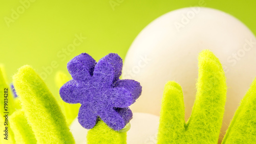 eggs in green basket made of fabric