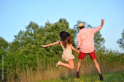 young couple in love having fun and enjoying the beautiful nature