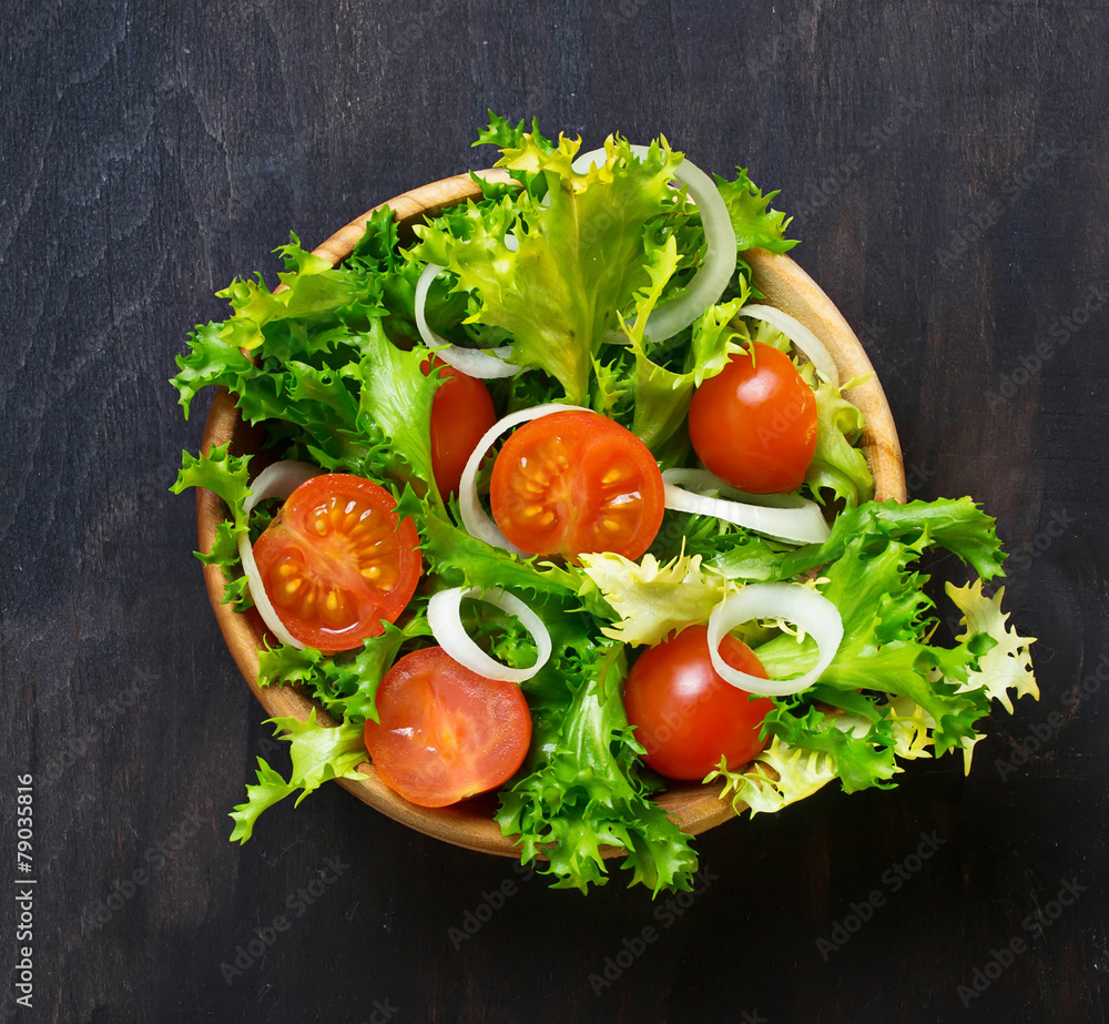 Fresh salad with tomato, frisee and onion Fresh salad with tomato, frisee and onion