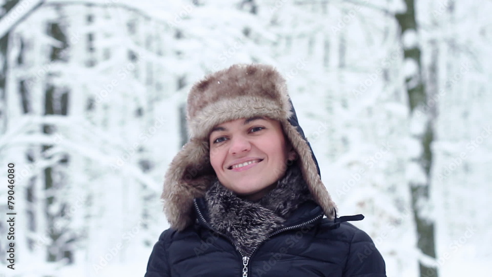 Portrait of a young woman in winter forest Portrait of a young woman in winter forest
