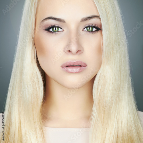 Young blond woman.Beautiful Girl.make-up portrait.green eyes