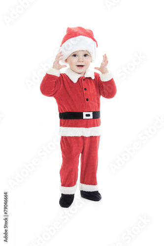 little happy boy in santa hat portrait