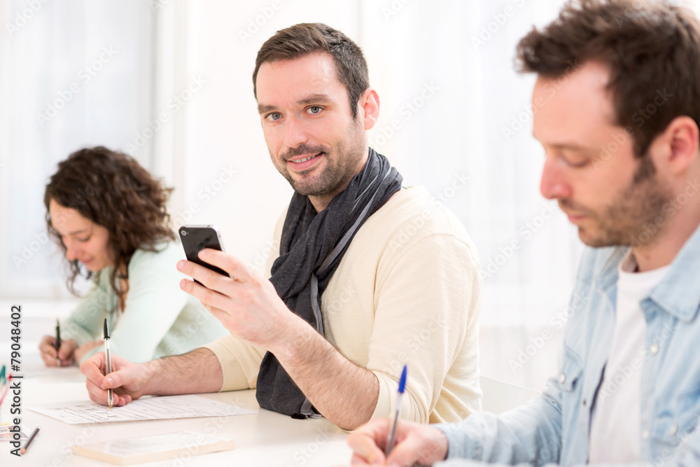 Obraz premium Young attractive student during classes