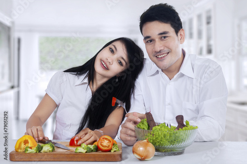 Healthy couple with fresh vegetables