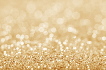 Gold defocused glitter background