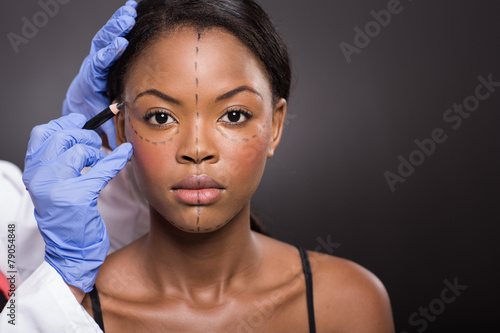 Photos young african woman with correction mark